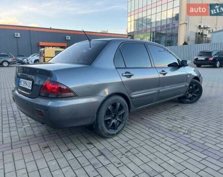 Серый Мицубиси Лансер, объемом двигателя 1.6 л и пробегом 279 тыс. км за 3990 $, фото 4 на Automoto.ua