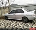 Сірий Міцубісі Lancer, об'ємом двигуна 1.6 л та пробігом 244 тис. км за 4800 $, фото 1 на Automoto.ua