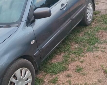 Серый Мицубиси Лансер, объемом двигателя 1.6 л и пробегом 270 тыс. км за 3700 $, фото 1 на Automoto.ua