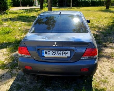Серый Мицубиси Лансер, объемом двигателя 1.6 л и пробегом 214 тыс. км за 4500 $, фото 5 на Automoto.ua