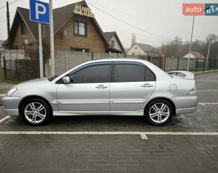 Сірий Міцубісі Lancer, об'ємом двигуна 2 л та пробігом 187 тис. км за 4500 $, фото 9 на Automoto.ua