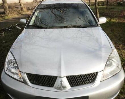 Серый Мицубиси Лансер, объемом двигателя 1.6 л и пробегом 234 тыс. км за 4300 $, фото 8 на Automoto.ua