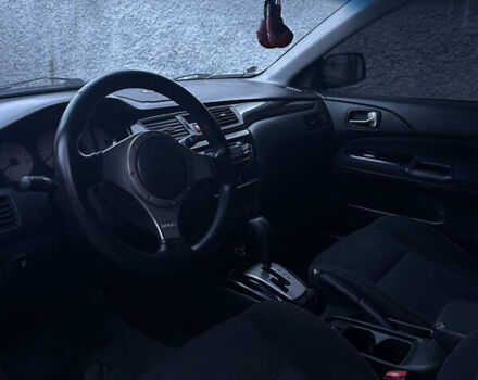 Сірий Міцубісі Lancer, об'ємом двигуна 2 л та пробігом 200 тис. км за 4999 $, фото 13 на Automoto.ua