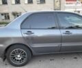 Сірий Міцубісі Lancer, об'ємом двигуна 1.6 л та пробігом 218 тис. км за 5700 $, фото 15 на Automoto.ua