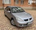 Сірий Міцубісі Lancer, об'ємом двигуна 1.6 л та пробігом 161 тис. км за 4999 $, фото 2 на Automoto.ua