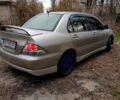 Сірий Міцубісі Lancer, об'ємом двигуна 20 л та пробігом 360 тис. км за 5500 $, фото 2 на Automoto.ua