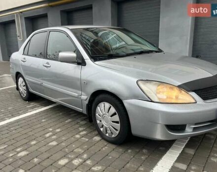 Серый Мицубиси Лансер, объемом двигателя 1.6 л и пробегом 333 тыс. км за 2800 $, фото 3 на Automoto.ua