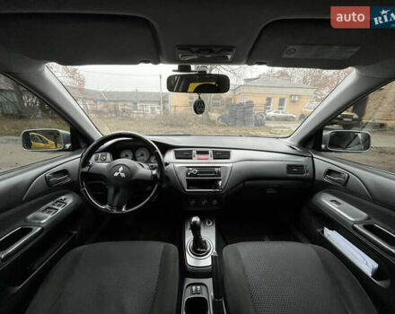 Сірий Міцубісі Lancer, об'ємом двигуна 1.58 л та пробігом 308 тис. км за 3700 $, фото 11 на Automoto.ua
