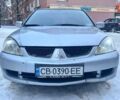 Серый Мицубиси Лансер, объемом двигателя 1.6 л и пробегом 290 тыс. км за 3300 $, фото 1 на Automoto.ua