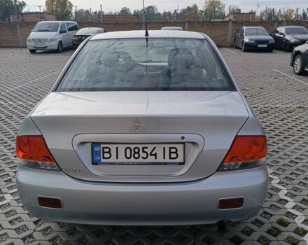 Сірий Міцубісі Lancer, об'ємом двигуна 1.6 л та пробігом 267 тис. км за 3600 $, фото 3 на Automoto.ua