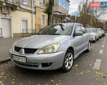 Серый Мицубиси Лансер, объемом двигателя 1.6 л и пробегом 444 тыс. км за 3400 $, фото 2 на Automoto.ua