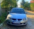 Сірий Міцубісі Lancer, об'ємом двигуна 1.6 л та пробігом 36 тис. км за 3500 $, фото 1 на Automoto.ua