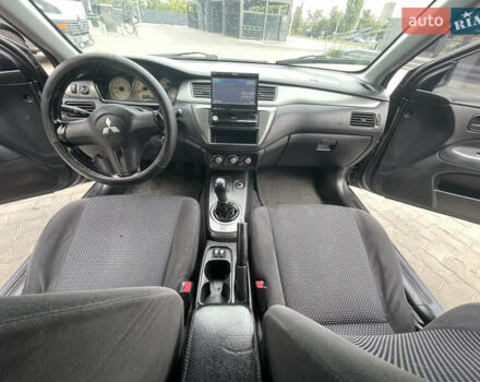 Сірий Міцубісі Lancer, об'ємом двигуна 1.58 л та пробігом 162 тис. км за 4650 $, фото 13 на Automoto.ua