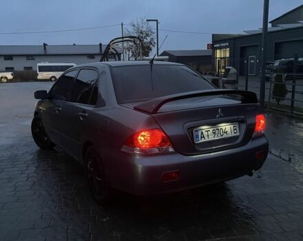 Серый Мицубиси Лансер, объемом двигателя 1.6 л и пробегом 213 тыс. км за 4450 $, фото 4 на Automoto.ua