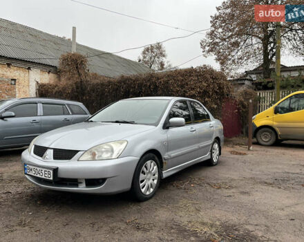 Сірий Міцубісі Lancer, об'ємом двигуна 1.58 л та пробігом 308 тис. км за 3700 $, фото 1 на Automoto.ua
