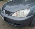 Сірий Міцубісі Lancer, об'ємом двигуна 1.6 л та пробігом 229 тис. км за 4900 $, фото 13 на Automoto.ua