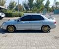 Сірий Міцубісі Lancer, об'ємом двигуна 1.58 л та пробігом 265 тис. км за 2900 $, фото 5 на Automoto.ua