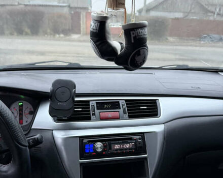 Серый Мицубиси Лансер, объемом двигателя 2 л и пробегом 256 тыс. км за 7000 $, фото 8 на Automoto.ua