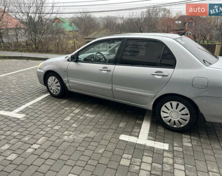 Сірий Міцубісі Lancer, об'ємом двигуна 1.58 л та пробігом 333 тис. км за 2450 $, фото 14 на Automoto.ua