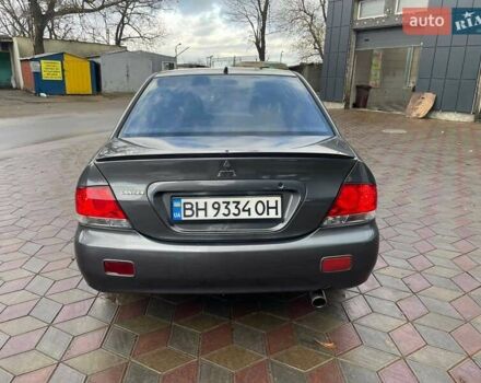 Сірий Міцубісі Lancer, об'ємом двигуна 1.6 л та пробігом 262 тис. км за 4400 $, фото 2 на Automoto.ua