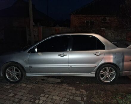 Сірий Міцубісі Lancer, об'ємом двигуна 2 л та пробігом 1000 тис. км за 3600 $, фото 4 на Automoto.ua
