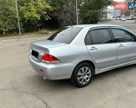 Серый Мицубиси Лансер, объемом двигателя 1.58 л и пробегом 183 тыс. км за 4800 $, фото 14 на Automoto.ua