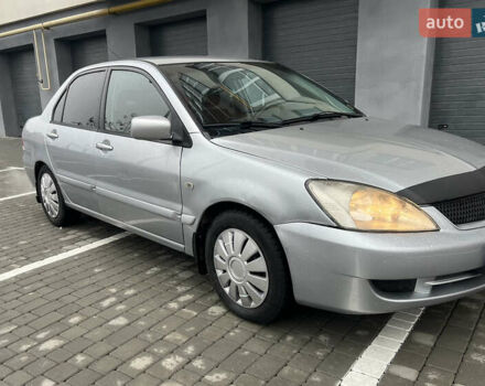 Серый Мицубиси Лансер, объемом двигателя 1.58 л и пробегом 333 тыс. км за 2800 $, фото 3 на Automoto.ua