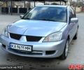 Серый Мицубиси Лансер, объемом двигателя 1.6 л и пробегом 218 тыс. км за 4100 $, фото 1 на Automoto.ua