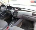 Сірий Міцубісі Lancer, об'ємом двигуна 2 л та пробігом 212 тис. км за 3333 $, фото 6 на Automoto.ua