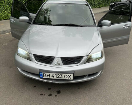 Сірий Міцубісі Lancer, об'ємом двигуна 2 л та пробігом 229 тис. км за 3800 $, фото 17 на Automoto.ua