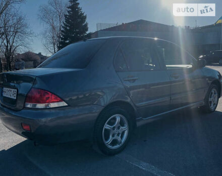 Сірий Міцубісі Lancer, об'ємом двигуна 1.6 л та пробігом 305 тис. км за 5200 $, фото 3 на Automoto.ua