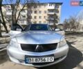 Серый Мицубиси Лансер, объемом двигателя 1.6 л и пробегом 350 тыс. км за 4400 $, фото 1 на Automoto.ua