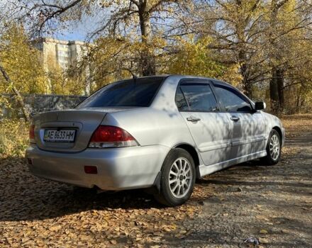 Серый Мицубиси Лансер, объемом двигателя 1.6 л и пробегом 204 тыс. км за 3999 $, фото 4 на Automoto.ua