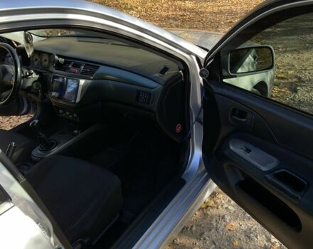 Серый Мицубиси Лансер, объемом двигателя 1.6 л и пробегом 204 тыс. км за 3999 $, фото 12 на Automoto.ua