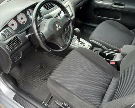 Міцубісі Lancer 2006 у Житомирі на Automoto.ua Сірий Міцубісі Lancer, об'ємом двигуна 1.58 л та пробігом 195 тис. км за 4999 $, фото 12 на Automoto.ua