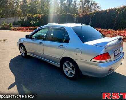 Сірий Міцубісі Lancer, об'ємом двигуна 1.6 л та пробігом 226 тис. км за 4000 $, фото 1 на Automoto.ua