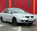 Сірий Міцубісі Lancer, об'ємом двигуна 1.6 л та пробігом 263 тис. км за 4190 $, фото 1 на Automoto.ua