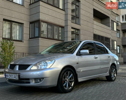 Серый Мицубиси Лансер, объемом двигателя 1.58 л и пробегом 244 тыс. км за 4950 $, фото 2 на Automoto.ua