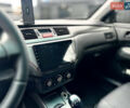 Сірий Міцубісі Lancer, об'ємом двигуна 1.58 л та пробігом 354 тис. км за 2999 $, фото 31 на Automoto.ua