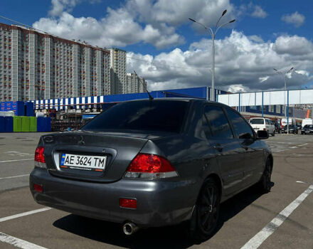 Сірий Міцубісі Lancer, об'ємом двигуна 1.6 л та пробігом 223 тис. км за 4500 $, фото 1 на Automoto.ua