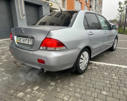 Серый Мицубиси Лансер, объемом двигателя 1.6 л и пробегом 333 тыс. км за 2800 $, фото 6 на Automoto.ua