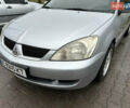 Сірий Міцубісі Lancer, об'ємом двигуна 1.6 л та пробігом 223 тис. км за 3900 $, фото 7 на Automoto.ua