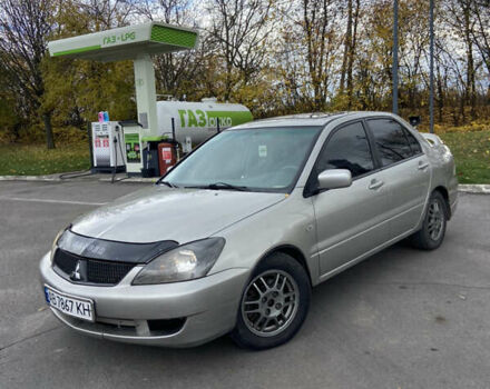 Мицубиси Лансер 2006 в Погребище на Automoto.ua Серый Мицубиси Лансер, объемом двигателя 2 л и пробегом 320 тыс. км за 3300 $, фото 6 на Automoto.ua
