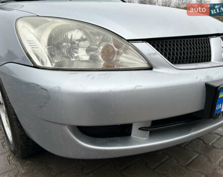 Сірий Міцубісі Lancer, об'ємом двигуна 1.6 л та пробігом 223 тис. км за 3900 $, фото 5 на Automoto.ua