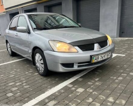 Серый Мицубиси Лансер, объемом двигателя 1.6 л и пробегом 333 тыс. км за 2800 $, фото 1 на Automoto.ua