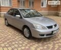 Сірий Міцубісі Lancer, об'ємом двигуна 1.6 л та пробігом 161 тис. км за 4999 $, фото 8 на Automoto.ua