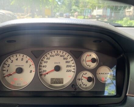 Серый Мицубиси Лансер, объемом двигателя 1.6 л и пробегом 140 тыс. км за 5000 $, фото 3 на Automoto.ua