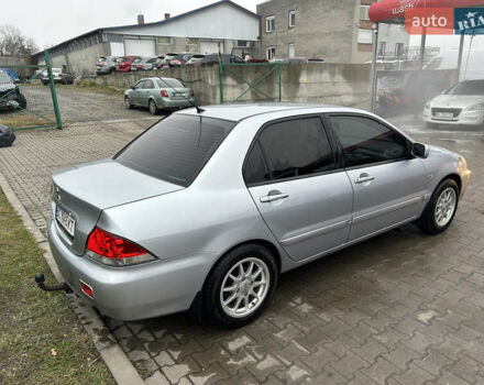 Сірий Міцубісі Lancer, об'ємом двигуна 1.6 л та пробігом 223 тис. км за 3900 $, фото 4 на Automoto.ua