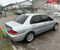 Сірий Міцубісі Lancer, об'ємом двигуна 1.6 л та пробігом 223 тис. км за 3900 $, фото 4 на Automoto.ua