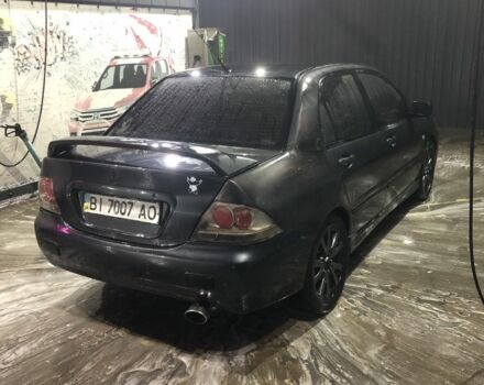 Міцубісі Lancer 2006 у Синельниковом на Automoto.ua Сірий Міцубісі Lancer, об'ємом двигуна 2 л та пробігом 200 тис. км за 3000 $, фото 7 на Automoto.ua